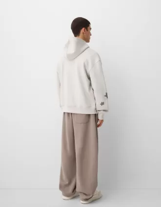 Sudadera con capucha oversize estampada