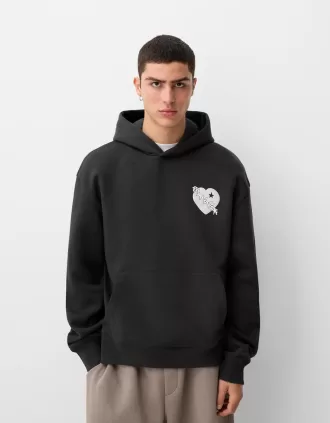 Sudadera con capucha oversize estampada