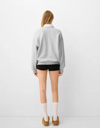 Sudadera oversize con bolsillos laterales