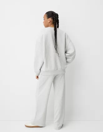 Sudadera oversize con bolsillos laterales