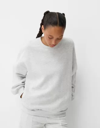 Sudadera oversize con bolsillos laterales