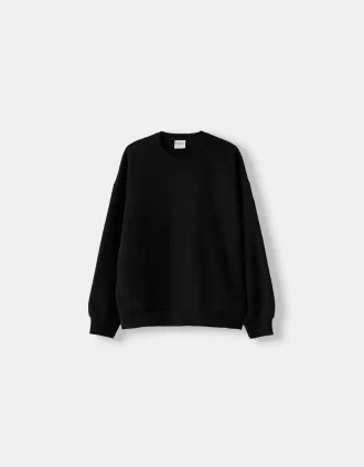 Sudadera oversize con bolsillos laterales
