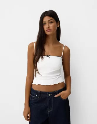Top de tirantes con estampado animal y detalle de lazo