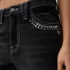 Vaqueros anchos estilo años 90 con tachuelas