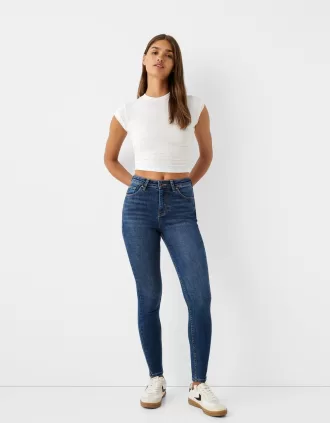 Vaqueros pitillo de talle muy alto